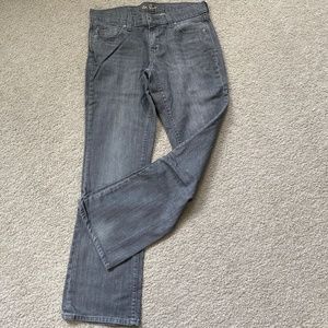 Mid rise boot cut size 6 stretch jeans